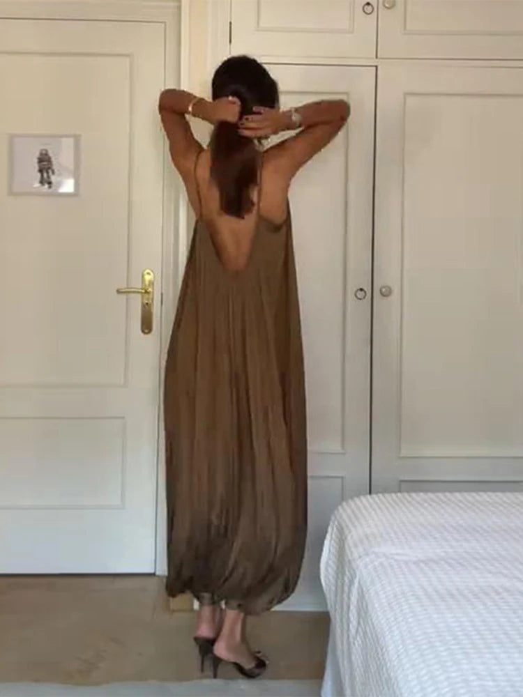 Spaghetti strap Sleeveless Pleated Jumpsuit Women Charming Solid Backless Lantern Romper Fashionable Office Lady Streetwear New