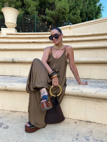 Spaghetti strap Sleeveless Pleated Jumpsuit Women Charming Solid Backless Lantern Romper Fashionable Office Lady Streetwear New