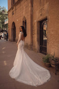 Glamorous Mermaid Wedding Gown with Sparkling Lace, Sequins, and a Flowing Tulle Train for a Breathtaking Bridal Entrance