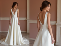 Glamorous White A-Line Bridal Gown with Sparkling Beads and Elegant Train