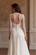 Graceful Illusion Long Sleeve Wedding Dress with Beaded Sheer Bodice and Flowing Skirt